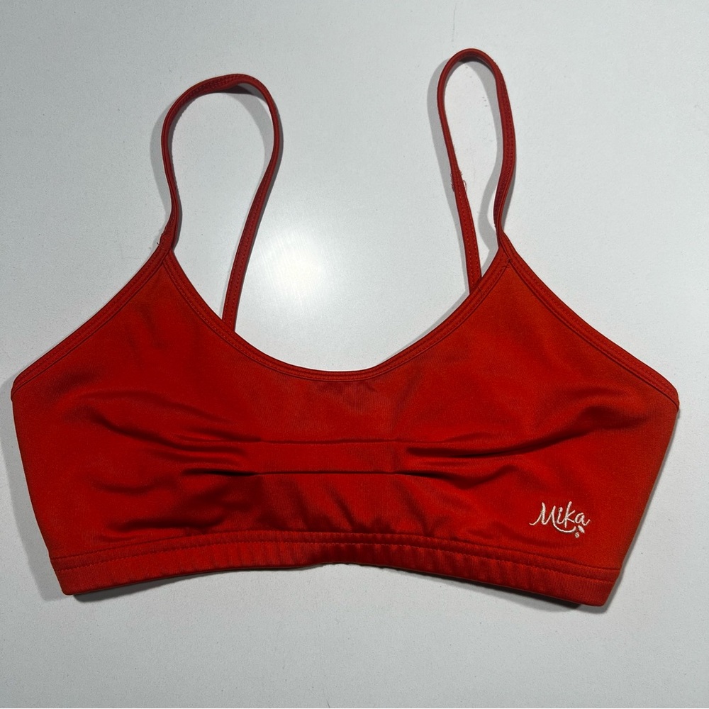 Orange Mika sports bra with string tie back
